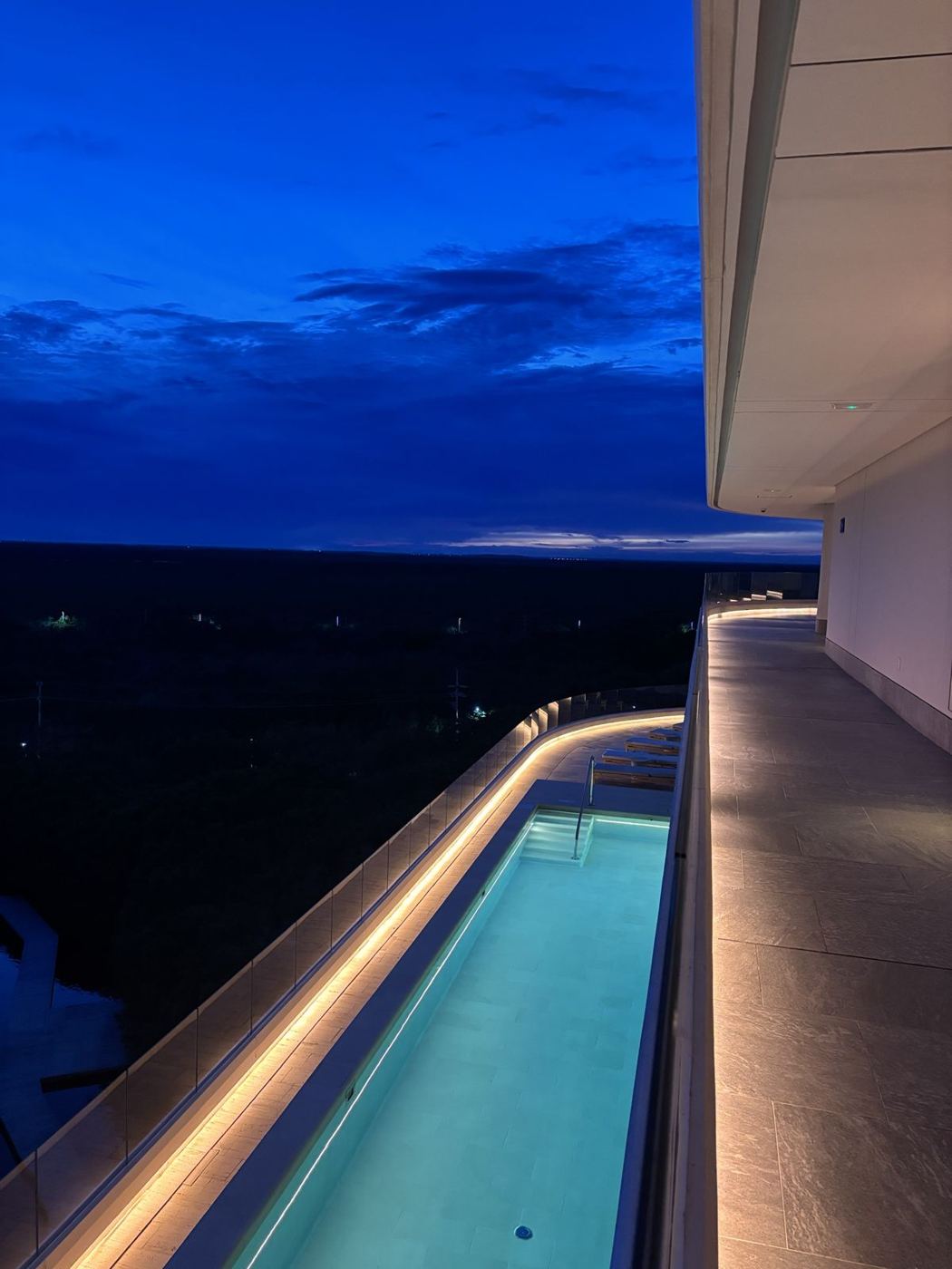 The rooftop pool at blue hour
